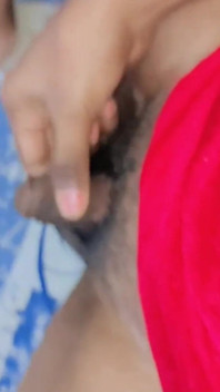 Shemale Rubbing Her Flaccid Penis and Trying Hard to Get It Erect