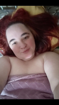 Redhead in the Bed