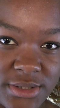 Ebony amateur Kandi shoves a dildo into her oiled up asshole