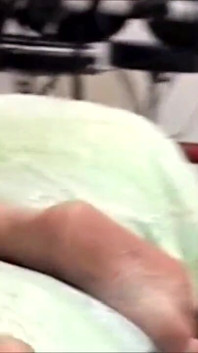 Titty slut touches her pussy with dildo while watching porn
