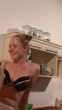 Lesbian babes have fun in kitchen