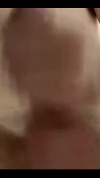 Masturbating