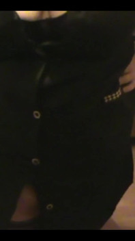 Robe-wearing Dominatrix