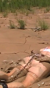 Julie Cunningham in Lingerie Wriggles Hard in Mud Hogtied with Chains. Sploshing Dirty Whore. Huge Tits Covered in Mud.