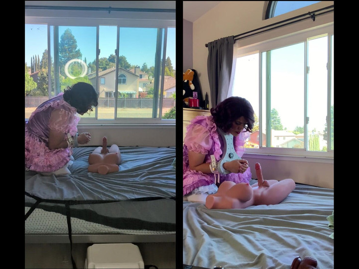 Sissy Candy: ピンクのサテンのシシーメイドがロックされたままセックスドールのおもちゃに乗っている