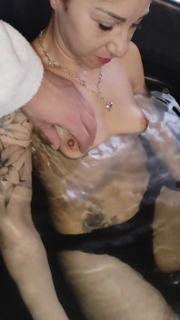 Relaxing in the Jacuzzi, They're Massaging My Breasts