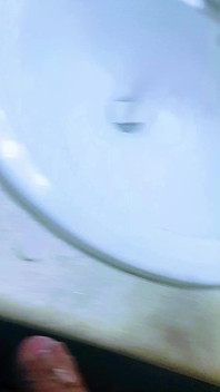 Masturbating