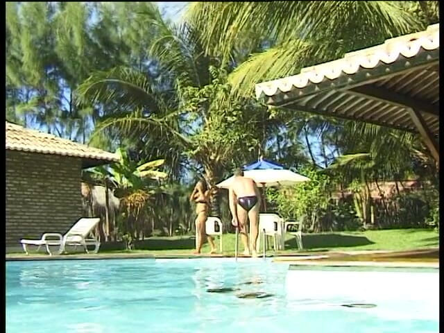 Lucky Cooch: Ebony babe have a nice time in the pool with...
