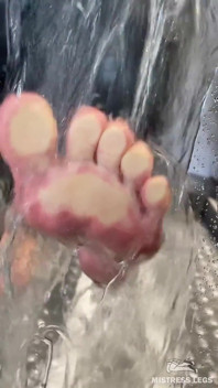 Sexy Wet Bare Foot Pressed Against Glass in Shower