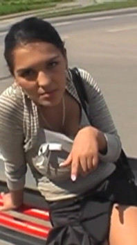 Hot brunette sucks a truck driver's cock in a parking lot making him cum