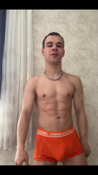 Cute Athlet Boy Showing Muscle
