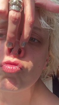 No Makeup Goth Girl in the Sun Flares Piggy Nose