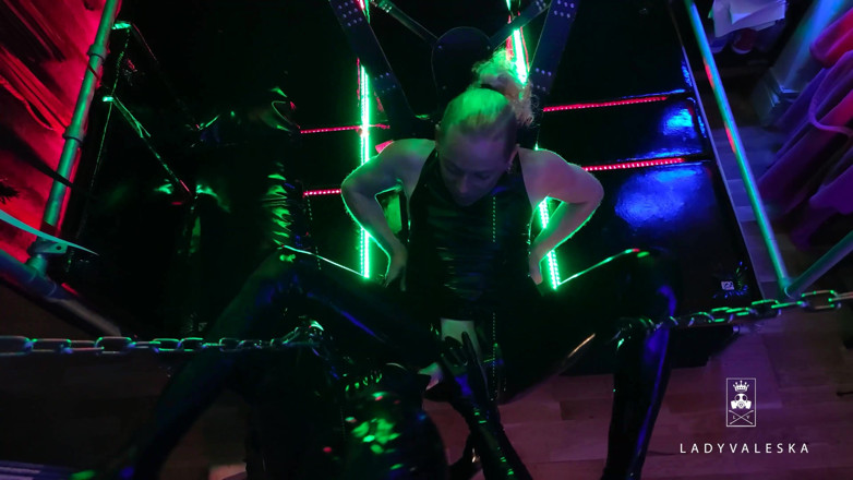 Lady Valeska: The rubber Domme the giant dildo and the gimp