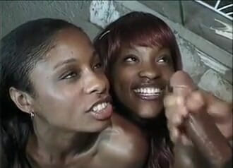 Outdoor pervs: Two ebony babes share BBC