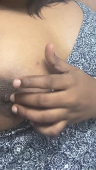 Playing with Her Nipple