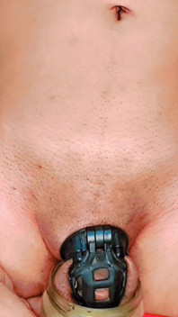 Standing Pissing in Chastity Cage