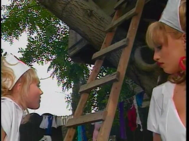 A Lesbian World: Three lesbian nurses eat pussy outdoors