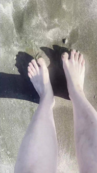Piedi da spiaggia provocanti