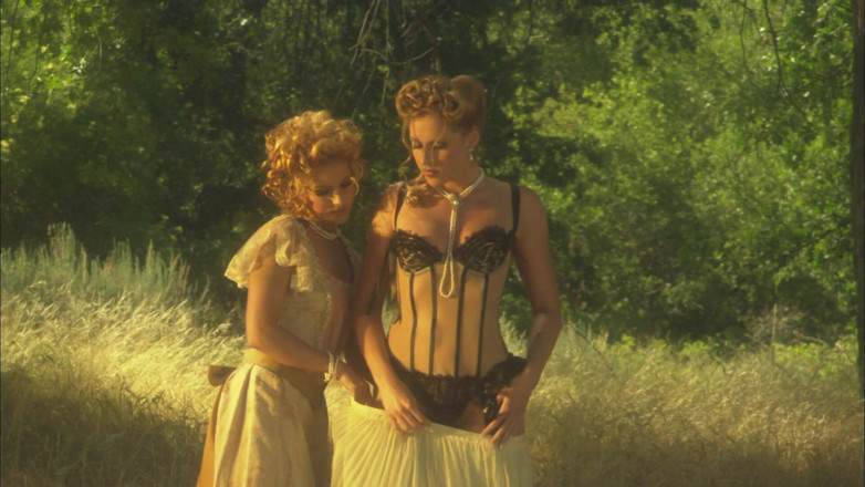 Girl on Girl: Erotic lesbians romance passionately in the wild