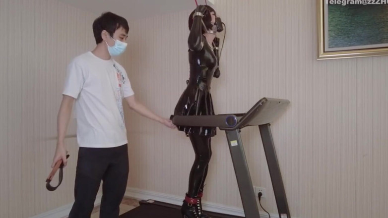 Aisan girl bondage: Mz24 - a Girl Bound to a Treadmill with Metal Restraints...