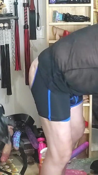 Blondie Dances While Shoving Her Cock in His Ass