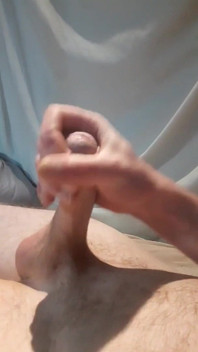 Masturbating