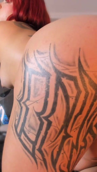 Latina Shakes Her Tattooed Butt