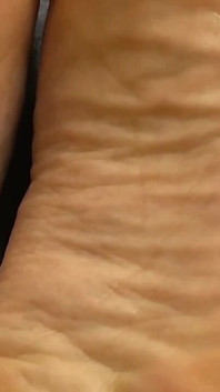 Extreme Close-up of Pink Foxx's Soles