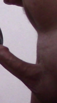 Close-up of a MILF Sucking a Cock and Taking a Load in Her Mouth.