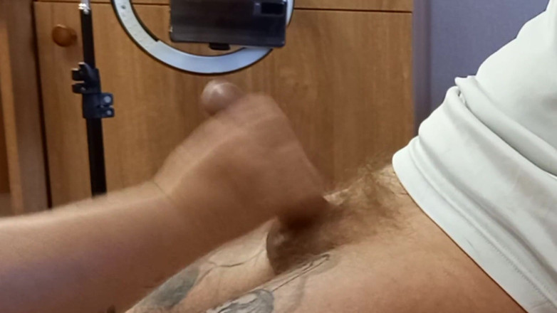 Zona901: close-up cumshot from manual penis stimulation by a fat woman