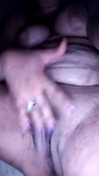 Latina with Big Breasts Leans Against Her Bedroom Wall When She's Home Alone
