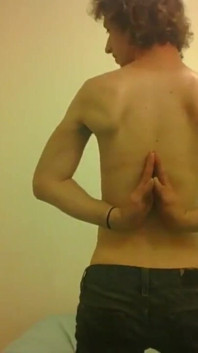 Topless Transgirl Surprised at Her Own Flexibility