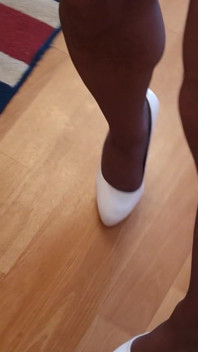 Walking in My High White Shiny Stilettos