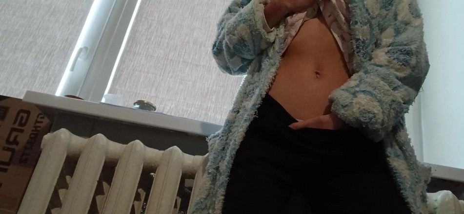 Lesbian-candys: A Slender Brunette in a Robe Masturbates at Home After...