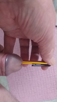 Stepdaddy Stands on the Toilet and Plays with His Penis but a Pen