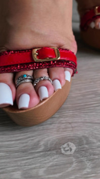 Red Heels and White Nails