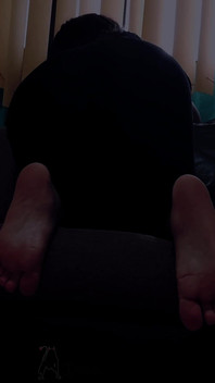 Housewife with Bare Feet and Tight Yoga Pants Is Waiting for You to Fulfill Your Desires