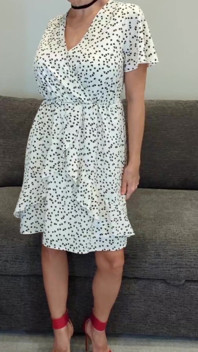 Sadie in a White Dress with Hearts and Red Heels