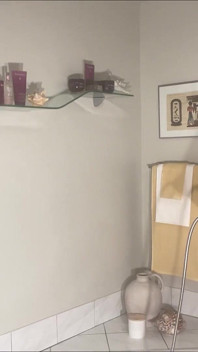 Klystýr v koupelně hotelového apartmá 2