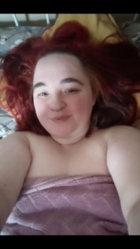 Redhead in the Bed