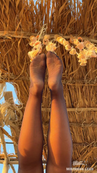 The Best View on the Beach Is Not the Sea, but My Feet in Black Tights Hanging Over Your Head