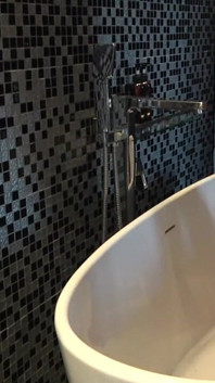Chubby Stepdaddy Pissing in Bathtub