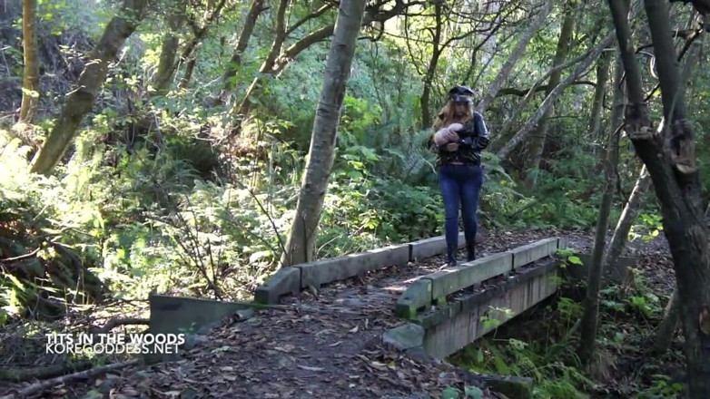 Kore Goddess: Huge tits in a rope harness roams the woods