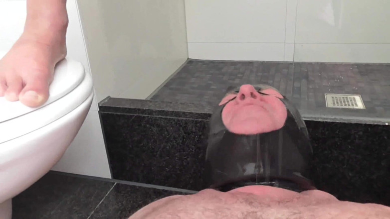 Femdom Austria: Golden Shower in Masked Face and Mouth