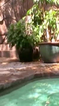 He Is Lying by the Pool When She Sits on His Cock