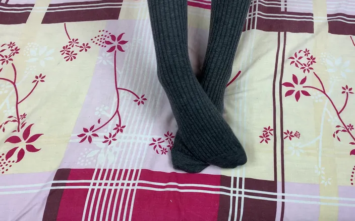 Gloria Gimson: Girl in Gray Long Socks on Her Legs Caresses Herself...