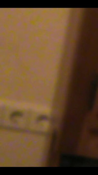 Robe-wearing Dominatrix