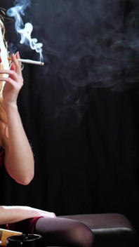 Russian Beauty Lost in Cigarette Smoke Haze