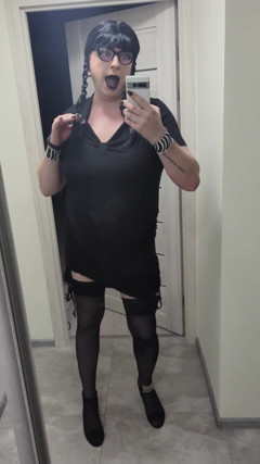 Sissy in Chastity Dances in Stockings & Heels with Big Fake Tits - Wednesday Addams Cosplay thumbnail
