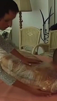 Plastic Wrapped Mature Slut Licked and Facesat by Horny Couple
